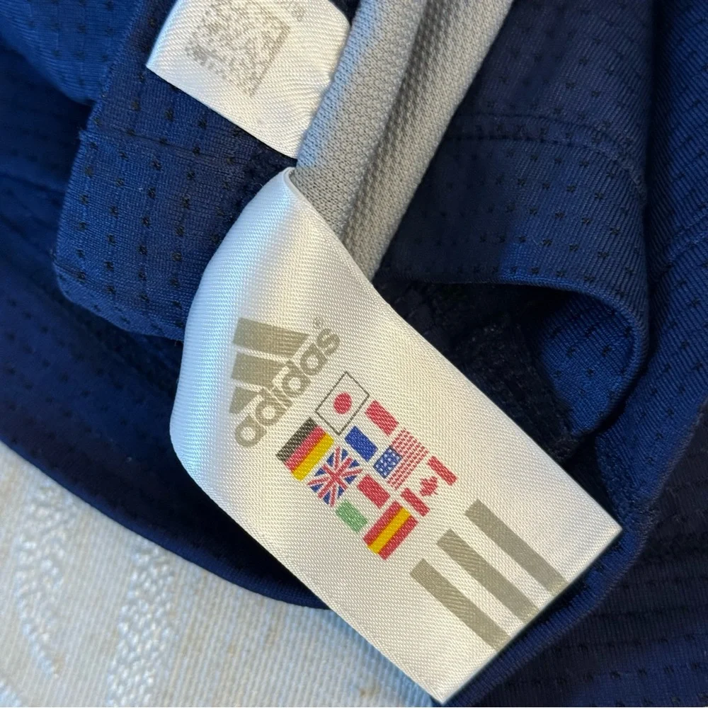 Adidas women's athletic climacool shorts size S. Navy blue with‎ purple stripes